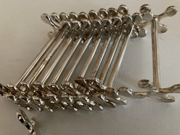 18 porte couteaux en métal argenté décor flocon